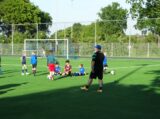 Laatste training S.K.N.W.K. JO10-1 van seizoen 2022-2023 (partijtje tegen de ouders) (162/165)